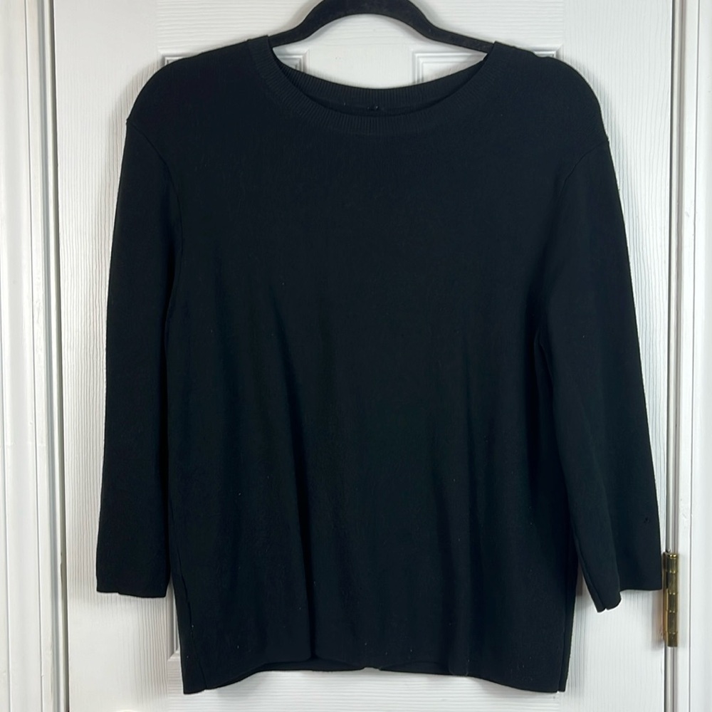 Black crew neck 3/4 length sleeves bust 20”. 65% viscose, 35% nylon